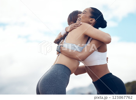 Fitness, friends and hug for sports exercise, workout and training for healthy lifestyle in nature. Happy active women hugging for sport friendship in cardio, health and wellness in the outdoors Fitness, friends and hug for sports exercise, workout and training for healthy lifestyle in nature. Happy active women hugging for sport friendship in cardio, health and wellness in the outdoors 123867762