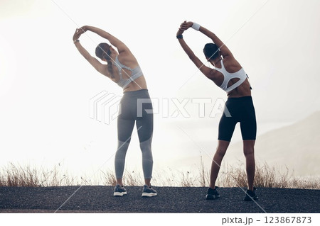 Stretching, fitness and women friends outdoor training for motivation, strength and collaboration on sky mock up. Personal trainer athlete people with workout, exercise or pilates on mountains 123867873