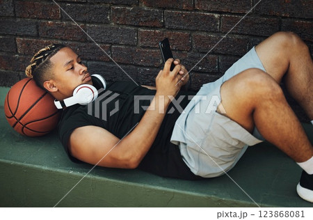 Training, friends and community support by basketball players hand connected in support of sports goal and vision. Fitness, trust and motivation on basketball court by happy, united professional men 123868081