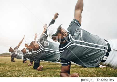 Baseball, sports and collaboration with a team stretching for a game or match on a field. Sport, fitness and exercise with a male athlete group in a warmup before training on grass for a workout 123868165