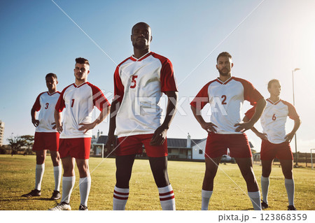 Football, soccer and portrait of team or group on field together ready for a match, game or competition. Fitness, diversity and men or players on grass field preparing for sports, workout or training 123868359