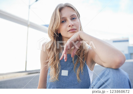 Fashion, beauty and city with a model woman outdoor on the road or street for contemporary and edgy style. Portrait, trendy and clothes with an attractive or stylish young female in an urban town Fashion, beauty and city with a model woman outdoor on the road or street for contemporary and edgy style. Portrait, trendy and clothes with an attractive or stylish young female in an urban town 123868672