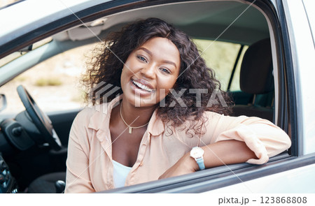 Black woman, car and smile of a relax person from Jamaica on a road trip with motor transport. Portrait of a happy and relax female in a vehicle enjoying a summer day with transportation travel 123868808
