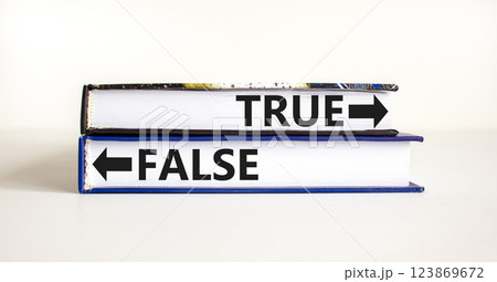 True or false symbol. Concept word True or False on beautiful books. Beautiful white table white background. Business and true or false concept. Copy space. 123869672