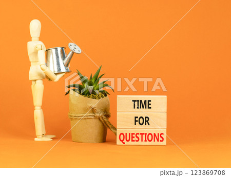Time for questions symbol. Concept words Time for questions on beautiful wooden blocks. Beautiful orange background. Businessman model. Business time for questions concept. Copy space. Time for questions symbol. Concept words Time for questions on beautiful wooden blocks. Beautiful orange background. Businessman model. Business time for questions concept. Copy space. 123869708