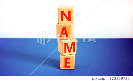 Name symbol. Concept word Name on beautiful wooden blocks. Beautiful white and blue background. Business, lifestyle, support and name concept. Copy space. Name symbol. Concept word Name on beautiful wooden blocks. Beautiful white and blue background. Business, lifestyle, support and name concept. Copy space. 123869726