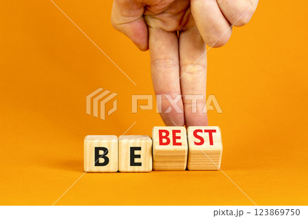 Motivational and inspirational be best symbol. Concept words Be best on beautiful wooden block. Beautiful orange background Businessman hand. Business motivational be best concept. Copy space. Motivational and inspirational be best symbol. Concept words Be best on beautiful wooden block. Beautiful orange background Businessman hand. Business motivational be best concept. Copy space. 123869750