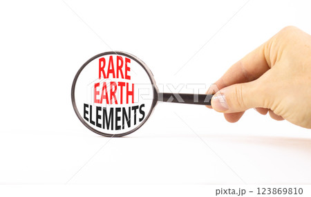 Rare earth elements symbol. Concept words Rare earth elements in beautiful magnifying glass. Beautiful white background. Businessman hand. Business and rare earth elements concept. Copy space. Rare earth elements symbol. Concept words Rare earth elements in beautiful magnifying glass. Beautiful white background. Businessman hand. Business and rare earth elements concept. Copy space. 123869810