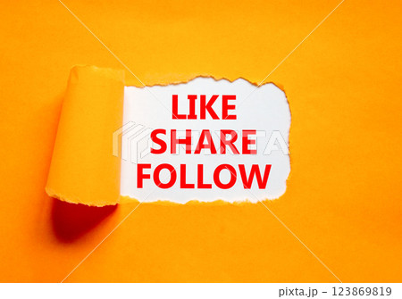 Like share follow symbol. Concept words Like Share Follow on beautiful white paper. Beautiful orange table orange background. Business like share follow concept. Copy space. 123869819