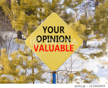 Your opinion valuable symbol. Concept words Your opinion valuable on beautiful yellow road sign. Beautiful snow forest background. Business your opinion valuable concept. Copy space. 123869845