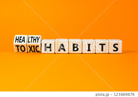 Healthy or toxic habits symbol. Concept words Healthy habits or Toxic habits on beautiful wooden blocks. Beautiful orange table orange background. Business healthy or toxic habits concept. Copy space. Healthy or toxic habits symbol. Concept words Healthy habits or Toxic habits on beautiful wooden blocks. Beautiful orange table orange background. Business healthy or toxic habits concept. Copy space. 123869876