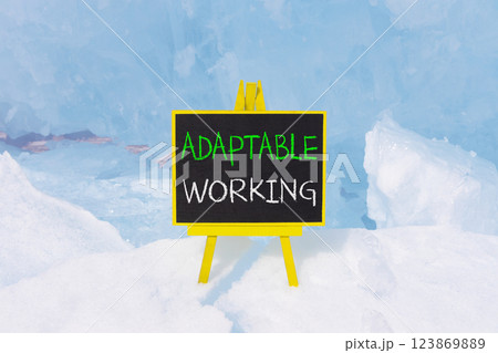 Adaptable working symbol. Concept words Adaptable working on beautiful yellow blackboard. Beautiful blue ice background. Business Adaptable working concept. Copy space. 123869889