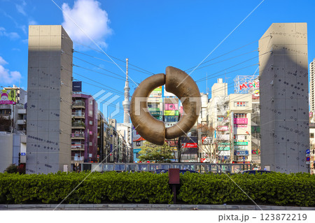 Urban Landmark Sculpture Under a Vibrant Blue Sky Surrounded, Japan Dec 8 2024 123872219