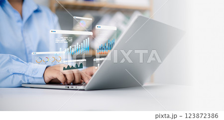 Business analytics with charts, Financial and marketing strategy, KPIs to improve organizational performance, Businessman use computers to analyze business and manage corporate data in office. Business analytics with charts, Financial and marketing strategy, KPIs to improve organizational performance, Businessman use computers to analyze business and manage corporate data in office. 123872386