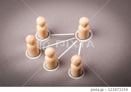 Human figures on a gray background. A hierarchical system within a company or organization 123873159