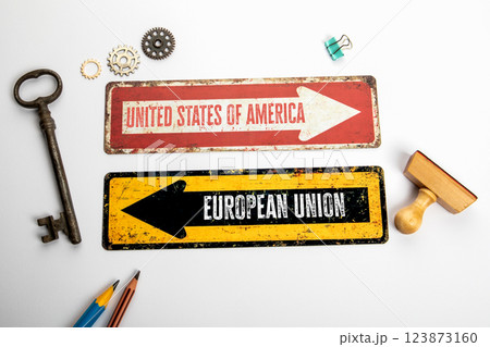 United States and European Union relations. Red and yellow directional arrow with text United States and European Union relations. Red and yellow directional arrow with text 123873160