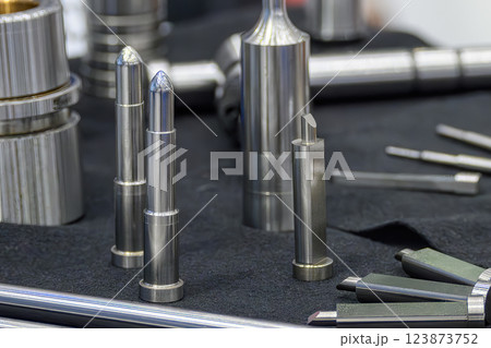 Close up scene the press die and injection mold standard parts. Close up scene the press die and injection mold standard parts. 123873752