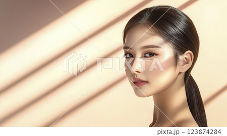Asian woman portrait with natural makeup and sunlit background beauty 123874284