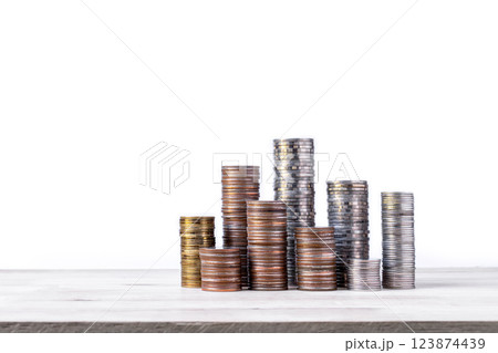 coins stacked on wooden with black background. Concept of saving money, economy, investment, growing business and wealth. 123874439