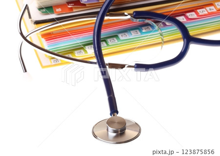 books and stethoscope isolated books and stethoscope isolated 123875856