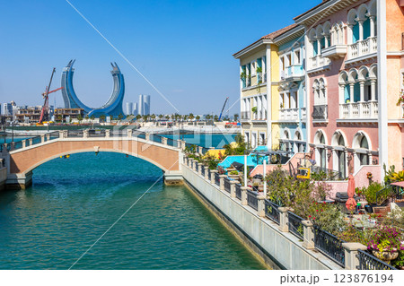 Qanat Quartier Venetian copy luxury residential district with authentic colorful apartment buildings and bridge over the canal, Pearl Island, Doha, Qatar 123876194