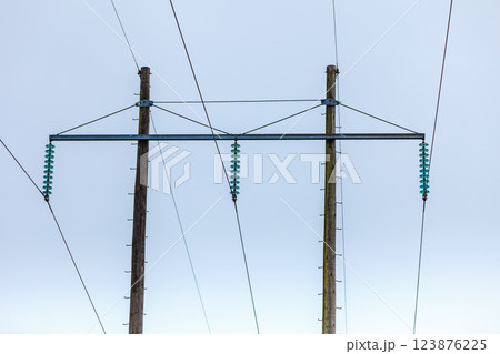 Voltage poles, electricity pylon, transmission power tower Voltage poles, electricity pylon, transmission power tower 123876225