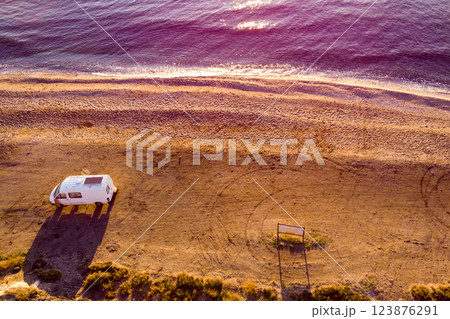 Caravan van on beach. Aerial view 123876291