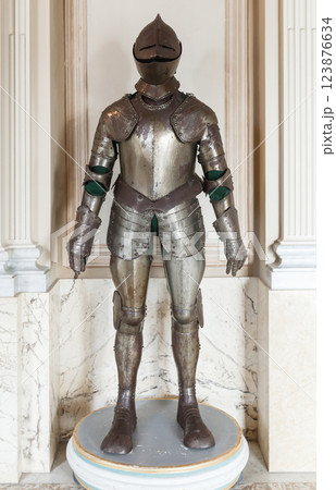 Medieval knights full suit armor displayed in a classical interior setting Medieval knights full suit armor displayed in a classical interior setting 123876634