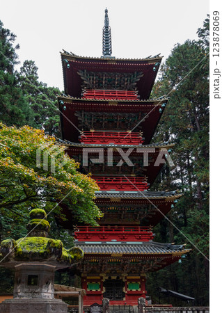 Five-story pagoda at Toshogu Shrine in Nikko Japan with intricate wooden details and red exterior 123878069