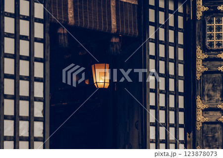 Soft lantern light illuminating the dim interior of a Japanese temple Soft lantern light illuminating the dim interior of a Japanese temple 123878073