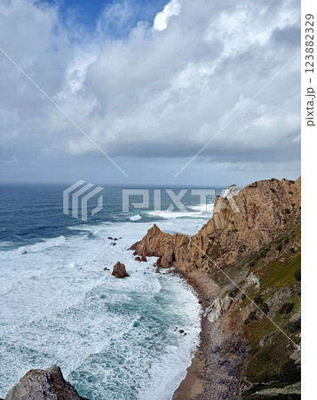 Cabo da Roca, the westernmost point of Europe, overlooking the Atlantic Ocean on the rocky edge Cabo da Roca, the westernmost point of Europe, overlooking the Atlantic Ocean on the rocky edge 123882329
