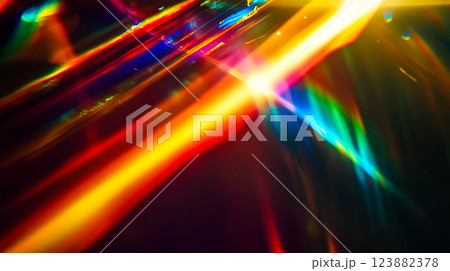 Multicoloured rainbow leak and light on black vintage background. Vivid colours mixing. Neon holographic colors gradient. Prism reflection, lens flare This is AI-generated item Multicoloured rainbow leak and light on black vintage background. Vivid colours mixing. Neon holographic colors gradient. Prism reflection, lens flare This is AI-generated item 123882378