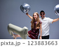 A vibrant celebration with disco balls and joyful dance moves that excite everyone involved 123883663