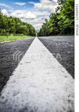 The white line on the road 123889451