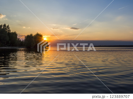 Evening sunset on the lake 123889707