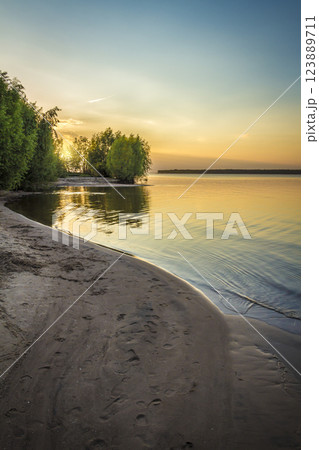 Beautiful evening river landscape Beautiful evening river landscape 123889711