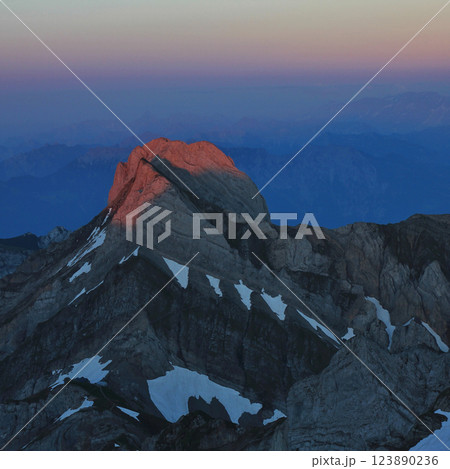 Peak of Mount Altmann at sunset. View from Mount Saentis, Switzerland. 123890236