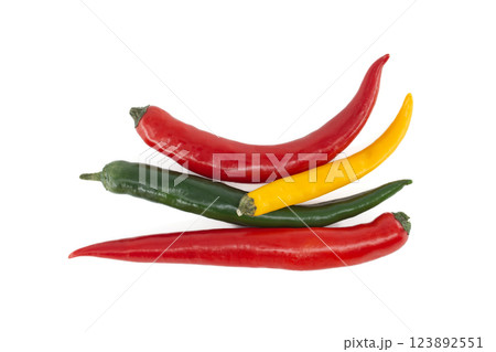Colorful chili peppers isolated on white background 123892551