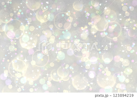 シルバーのキラキラ背景　イルミネーション　玉ボケ　光 123894219