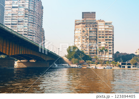 Cityscape view of Cairo with a bridge crossing the Nile River under the sunlight 123894405