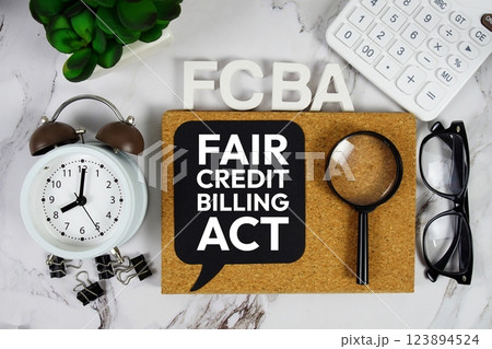FCBA - Fair Credit Billing Act acronym with calculator, alarm clock and magnifying glass, Business and Financial concept background FCBA - Fair Credit Billing Act acronym with calculator, alarm clock and magnifying glass, Business and Financial concept background 123894524
