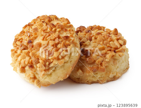 Deliciously baked cookies topped with crunchy nuts ready to be enjoyed any time of day Deliciously baked cookies topped with crunchy nuts ready to be enjoyed any time of day 123895639