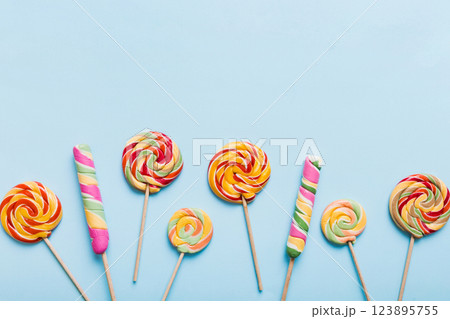 Set of colorful lollipops on colored background. Summer concept. Party Happy Birthday or Minimalist Concept 123895755