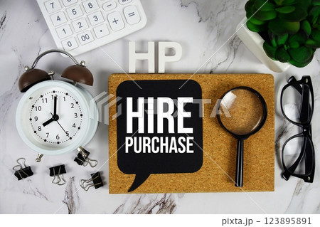 HP - Hire Purchase acronym with calculator, alarm clock and magnifying glass, business concept background HP - Hire Purchase acronym with calculator, alarm clock and magnifying glass, business concept background 123895891