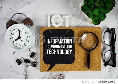 ICT - Information Communication Technology acronym with alarm clock and magnifying glass, business concept background 123895895