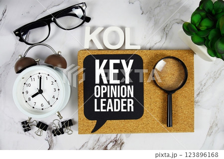 KOL - Key Opinion Leader acronym with alarm clock and magnifying glass, business concept background KOL - Key Opinion Leader acronym with alarm clock and magnifying glass, business concept background 123896168
