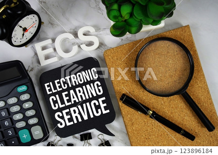 ECS - Electronic Clearing Service acronym with calculator, alarm clock and magnifying glass, business concept background ECS - Electronic Clearing Service acronym with calculator, alarm clock and magnifying glass, business concept background 123896184