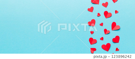 Valentine day background with red hearts, top view with copy space Valentine day background with red hearts, top view with copy space 123896242
