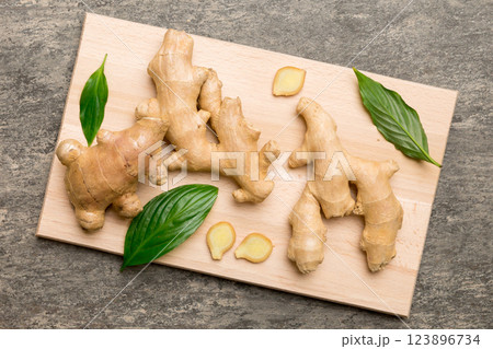 ginger on Cutting board table, top view. Space for text ginger on Cutting board table, top view. Space for text 123896734