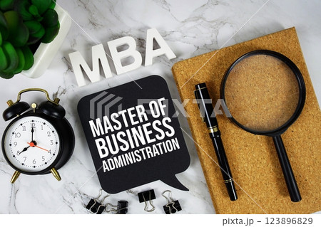 MBA - Master of Business Administration acronym with alarm clock and magnifying glass, business concept background MBA - Master of Business Administration acronym with alarm clock and magnifying glass, business concept background 123896829